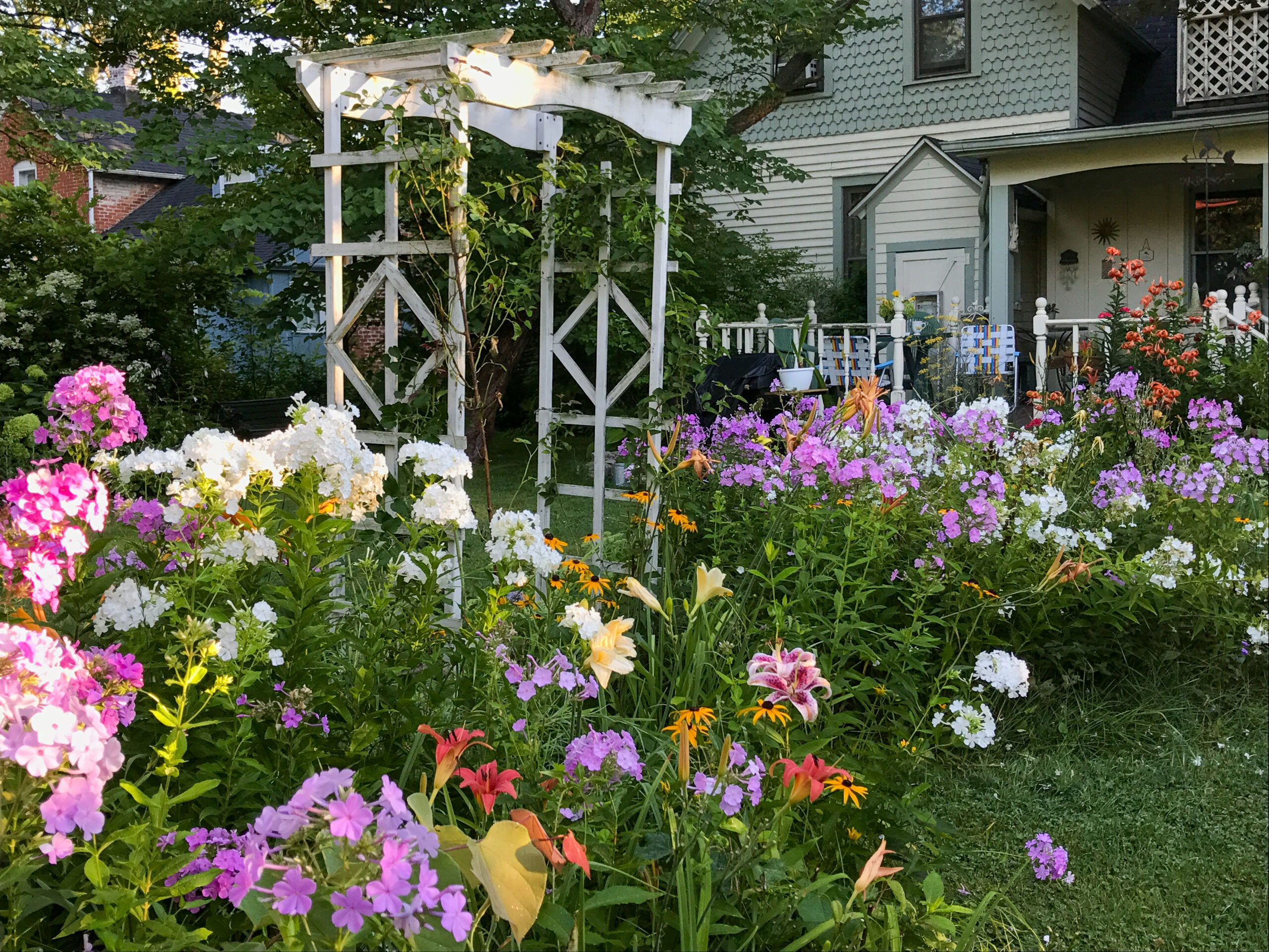 The cottage garden at Rosemary&rsquo;s home in Chesterton, Indiana &mdash; summer blooms in full glory